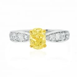 Желтый бриллиант в кольце из белого золота